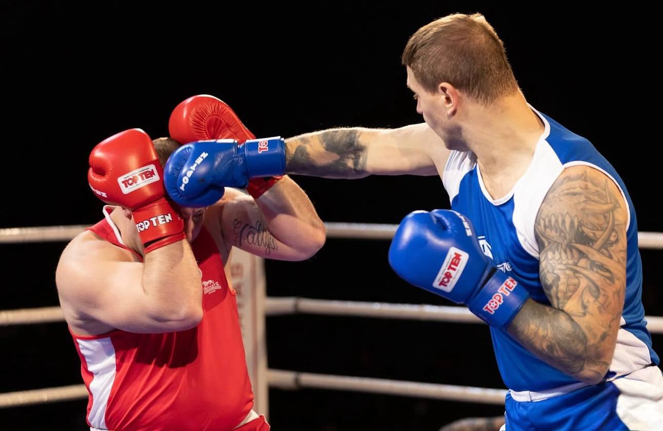 Precision punch during training, blue gloves